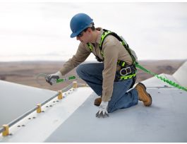Miller AirCore Wind Turbine harness with a lumbar wear pad and tools loops in a universal size in green